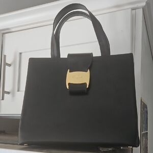 Elegant Black Handbag with Gold Accent